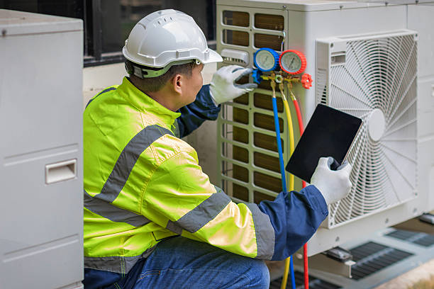 Professional Hvac technician working in Blakely, GA